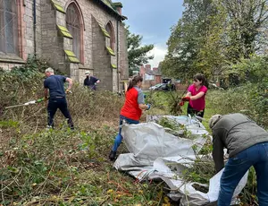 Volunteers from Veolia outside St Marys gardening