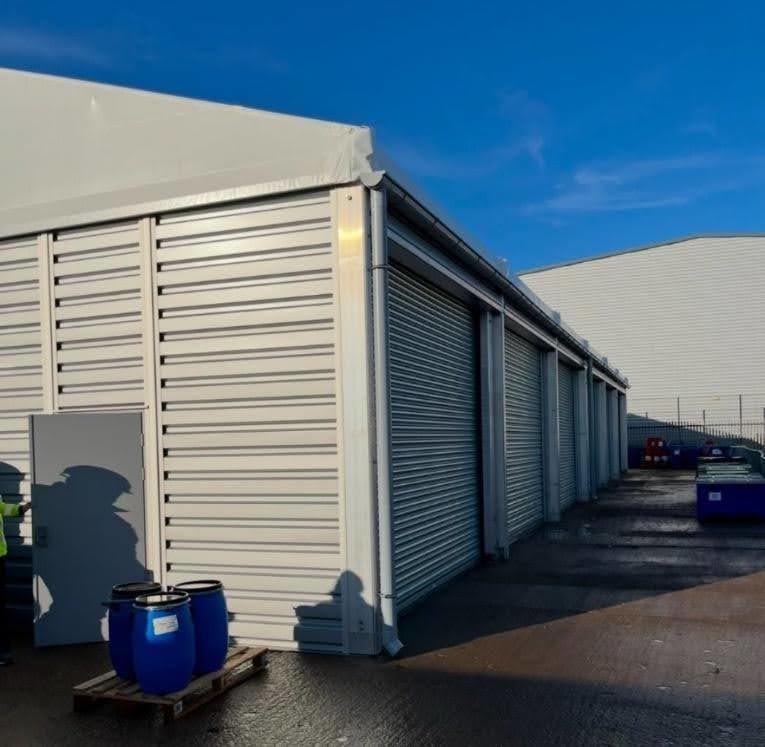 a building with roller shutter doors