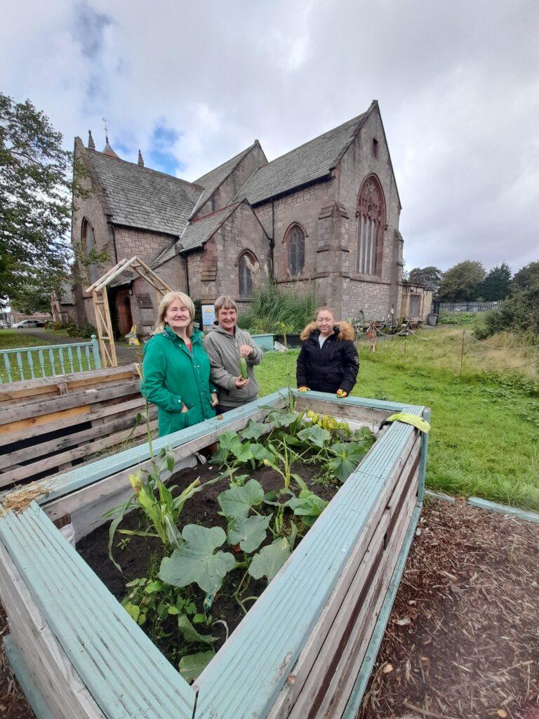 Volunteers outside St Marys Eco Garden Liscard
