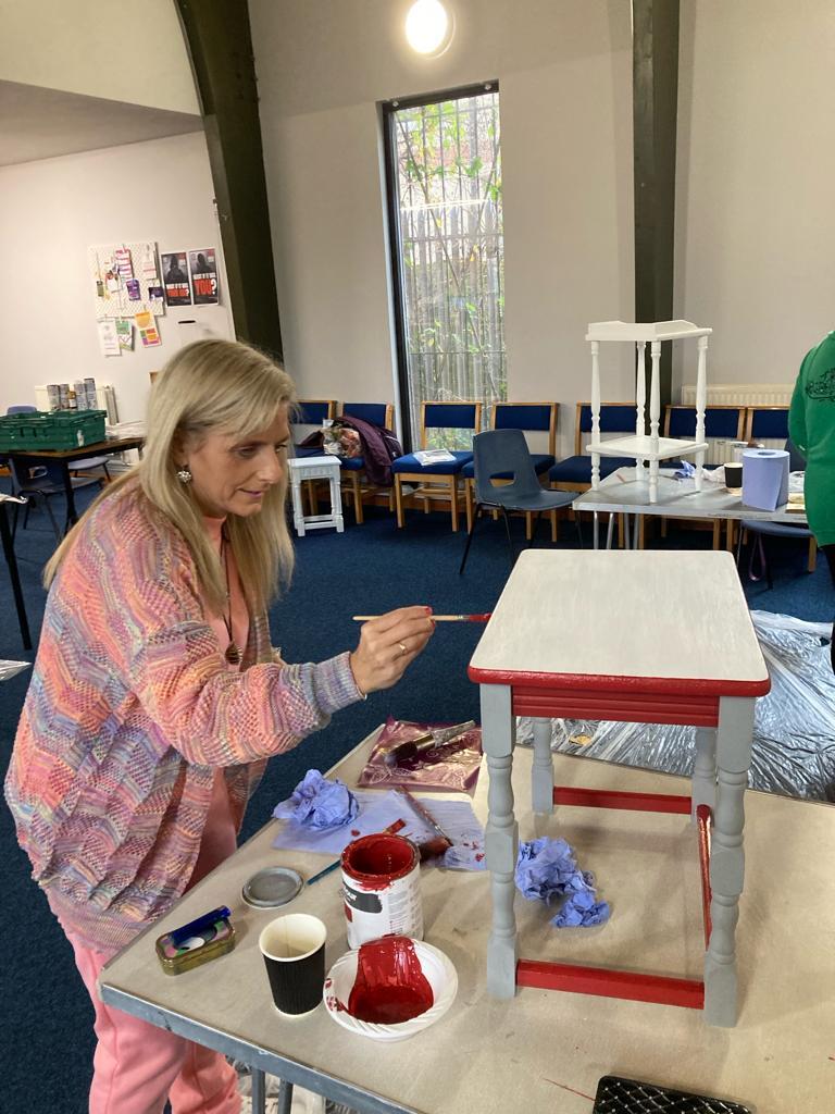 BEE Wirral project painting furniture as part of the Veolia and MRWA Community Fund