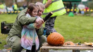 A family taking part in the great pumpkin smash day